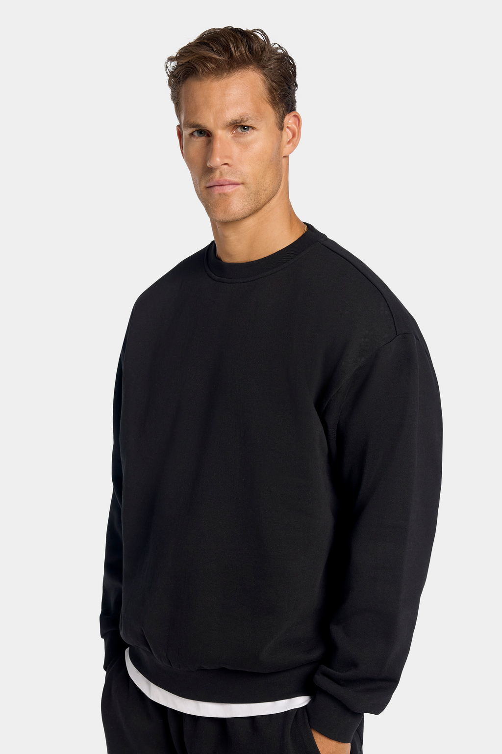 A CAMISOLA OVERSIZED DE GOLA REDONDA MILAN